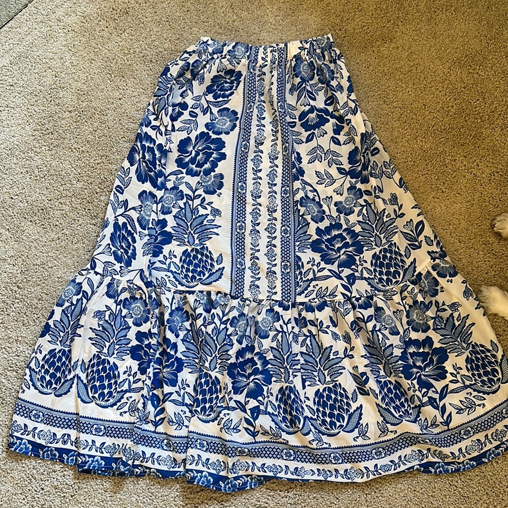 Swimsuit cover up also selling the bathing suit